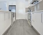 Laminate Flooring in a Kitchen by Urban Construction and Development - Flooring Solutions Oakville